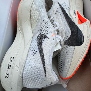 Nike women’s White and Black Running Shoes